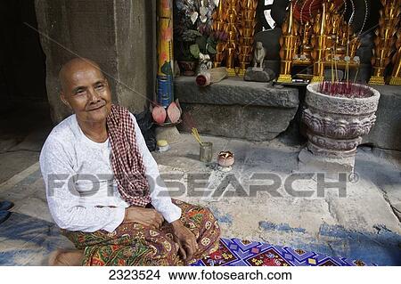 Picture - Cambodia, Portrait of Buddhist nun; Angkor Wat. Fotosearch