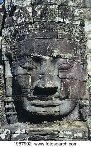 Cambodia, Siem Reap, Angkor Thom, Close-up of carved stone face of Jayavarman VII; Bayon View Large Photo Image Stock Image - Cambodia, Siem Reap, Angkor Thom, Close-up of carved stone face of Jayavarman VII; Bayon. Fotosearch