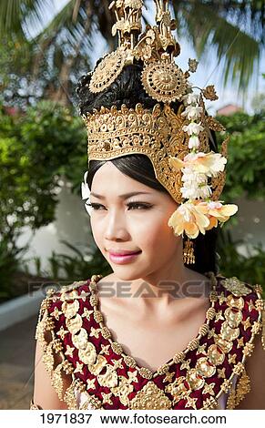 Cambodia, Siem Reap, Close Up Of Young Woman Wearing Traditional Dancer Attire. View Large Photo Image Stock Photo - Cambodia, Siem Reap, Close Up Of Young Woman Wearing Traditional Dancer Attire.. Fotosearch