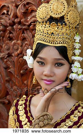 Cambodia, Siem Reap, Close Up Of Young Woman Wearing Traditional Dancer Attire. View Large Photo Image Stock Photography - Cambodia, Siem Reap, Close Up Of Young Woman Wearing Traditional Dancer Attire.. Fotosearch