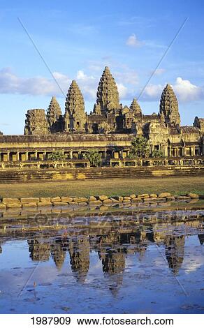 Stock Photo - Cambodia, Siem Reap, Temple reflecting in pond; Angkor Wat. Fotosearch