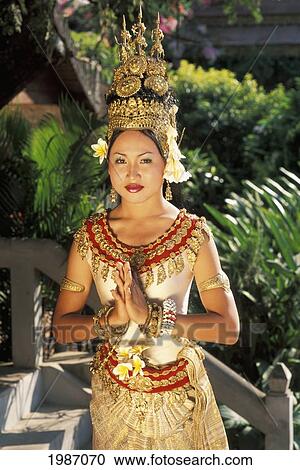 Cambodia, Woman in traditional dancing costume standing on steps; Siem Reap View Large Photo Image Stock Image - Cambodia, Woman in traditional dancing costume standing on steps; Siem Reap. Fotosearch