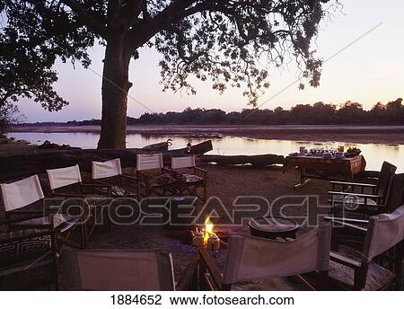 Camp Site With Fire Beside River View Large Photo Image Stock Image - Camp Site With Fire Beside River. Fotosearch