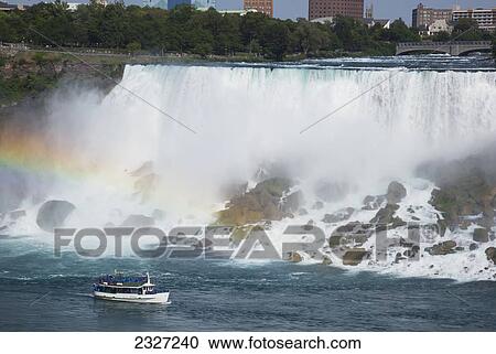 Stock Image - Canada, and Maid of Mist; Ontario, Niagara Falls (USA side). Fotosearch