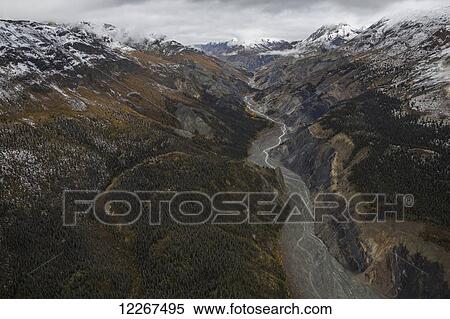 Canada Creek and the mountains surrounding it in Kluane National Park and Reserve; Yukon, Canada View Large Photo Image Stock Photography - Canada Creek and the mountains surrounding it in Kluane National Park and Reserve; Yukon, Canada. Fotosearch