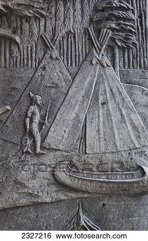 Stock Photograph - Canada, Ontario, Relief depicting Canadian history on building; Toronto. Fotosearch