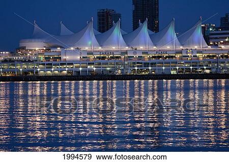 Stock Photo - Canada Place Reflected In Coal Harbor At Night, Vancouver, British Columbia, Canada. Fotosearch