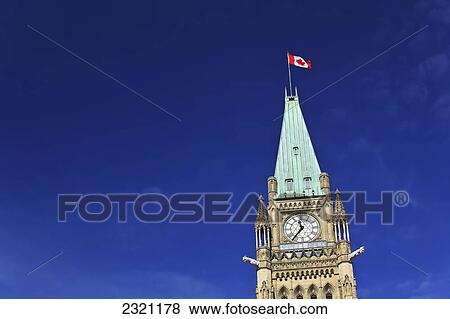 Canadian Flag On Peace Tower In Parliament Buildings; Ottawa Ontario Canada View Large Photo Image Stock Photo - Canadian Flag On Peace Tower In Parliament Buildings; Ottawa Ontario Canada. Fotosearch