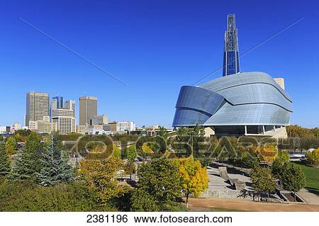 Stock Photograph - Canadian Museum for Human Rights and city skyline; Winnipeg, Manitoba, Canada. Fotosearch