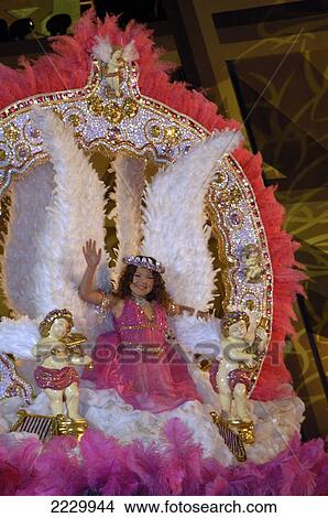 Canary Islands, Santa Cruz De Tenerife: Winner Of The Young Girls Competition At The Annual Carnival Queen Show Before The City's Carnival. Copyright Anna Watson/Axiom. View Large Photo Image Picture - Canary Islands, Santa Cruz De Tenerife: Winner Of The Young Girls Competition At The Annual Carnival Queen Show Before The City's Carnival. Copyright Anna Watson/Axiom.. Fotosearch