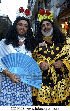 Stock Photo - Canary Islands, Santa Cruz De Tenerife: Men In Drag As Flamenco Dancers At The City's Annual Carnival. Copyright Anna Watson/Axiom.. Fotosearch