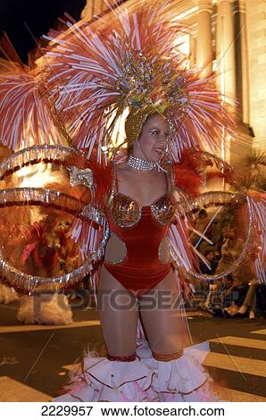 Stock Photo - Canary Islands, Santa Cruz De Tenerife: Dancer Processing Through The Streets At The City's Annual Carnival. Copyright Anna Watson/Axiom.. Fotosearch