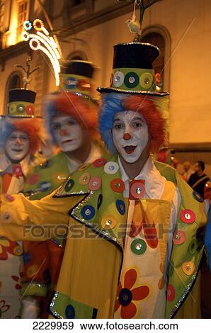 Canary Islands, Santa Cruz De Tenerife: Clowns Processing Through The Streets At The City's Annual Carnival. Copyright Anna Watson/Axiom. View Large Photo Image Stock Photo - Canary Islands, Santa Cruz De Tenerife: Clowns Processing Through The Streets At The City's Annual Carnival. Copyright Anna Watson/Axiom.. Fotosearch