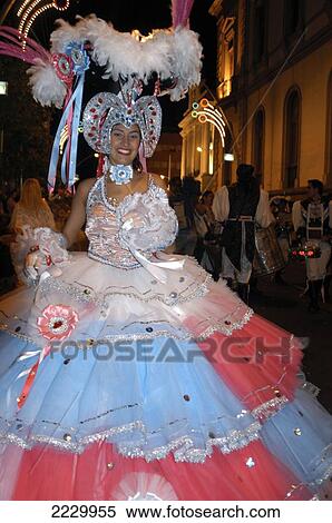 Stock Photography - Canary Islands, Santa Cruz De Tenerife: Dancer Processing Through The Streets At The City's Annual Carnival. Copyright Anna Watson/Axiom.. Fotosearch