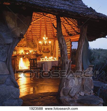 Stock Photo - Candlelit Hut. Fotosearch