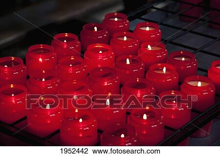 Stock Image - Candles In The Church Of The Beguinage Of Bruges (Begijnhof Of Brugge), West Flanders, Belgium. Fotosearch