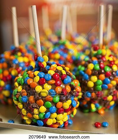 Stock Photo - Candy Apples On A Store Counter. Banff, Alberta, Canada.. Fotosearch
