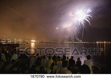 Cannes, Provence, France; A Crowd Watches Fireworks Over The Water From The Shore View Large Photo Image Stock Image - Cannes, Provence, France; A Crowd Watches Fireworks Over The Water From The Shore. Fotosearch