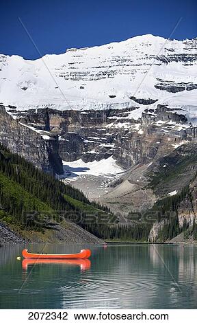 Canoe On Lake Louise With Victoria Glacier In The Background, Banff National Park, Alberta, Canada View Large Photo Image Stock Image - Canoe On Lake Louise With Victoria Glacier In The Background, Banff National Park, Alberta, Canada. Fotosearch