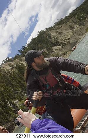 Canted Angle Of A Rocky Mountain Raft Tour Float Trip At Bow Falls, Banff National Park, Alberta, Canada View Large Photo Image Stock Image - Canted Angle Of A Rocky Mountain Raft Tour Float Trip At Bow Falls, Banff National Park, Alberta, Canada. Fotosearch