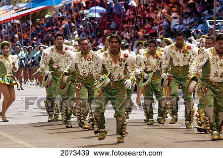 Caporales Dancers In The Procession Of The Carnaval De Oruro, Oruro, Bolivia View Large Photo Image Stock Photo - Caporales Dancers In The Procession Of The Carnaval De Oruro, Oruro, Bolivia. Fotosearch