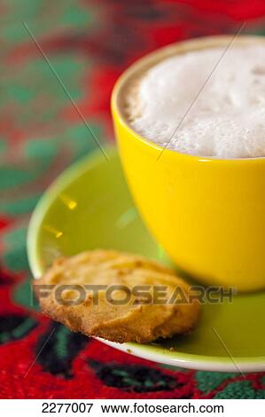 Cappuccino with biscuit in Tart of my Aunt cafe; Amsterdam, Holland View Large Photo Image Stock Photo - Cappuccino with biscuit in Tart of my Aunt cafe; Amsterdam, Holland. Fotosearch