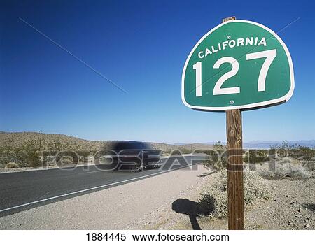 Car And Road Sign In The Mojave Desert View Large Photo Image Stock Photography - Car And Road Sign In The Mojave Desert. Fotosearch