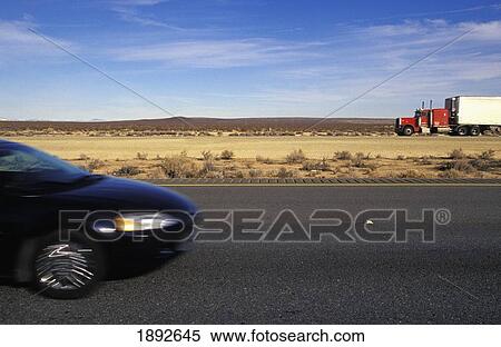 Car And Truck On Highway Through Mojave Desert View Large Photo Image Stock Photography - Car And Truck On Highway Through Mojave Desert. Fotosearch