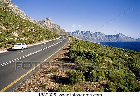Stock Photography - Car Driving Along Coastline On Garden Route. Fotosearch
