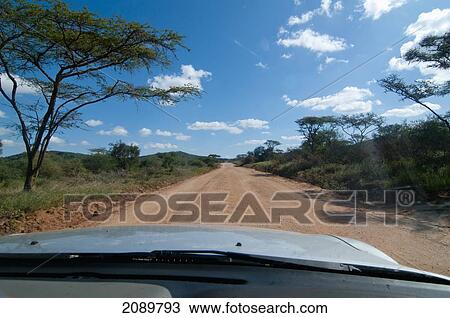 Car On Kilimanjaro Road At Amboseli, Kenya View Large Photo Image Stock Image - Car On Kilimanjaro Road At Amboseli, Kenya. Fotosearch