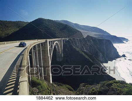 Stock Image - Car On Route 1 Crossing The Bixby Creek Bridge By Coast. Fotosearch