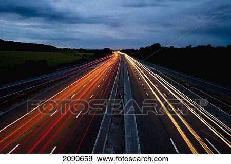 Car Trails On The Freeway At Night In Wiltshire, Uk View Large Photo Image Stock Photo - Car Trails On The Freeway At Night In Wiltshire, Uk. Fotosearch