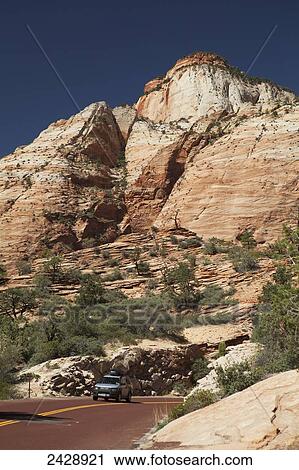 Car with luggage carrier traveling on Route Nine, Zion Mt. Carmel Highway, Zion National Park; Utah, United States of America View Large Photo Image Stock Image - Car with luggage carrier traveling on Route Nine, Zion Mt. Carmel Highway, Zion National Park; Utah, United States of America. Fotosearch