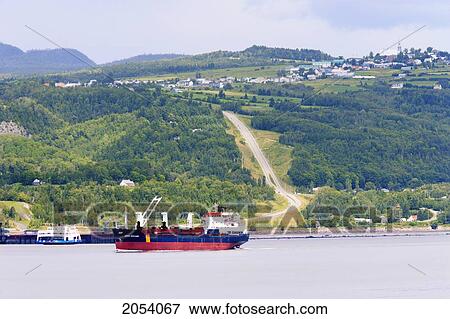 Stock Photo - Cargo Boat On The St. Lawrence River, Saint-Joseph-De-La-Rive And Les Eboulements Village, Charlevoix Region, Quebec. Fotosearch