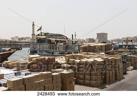 Cargo piled up on the waterfront; Dubai, United Arab Emirates View Large Photo Image Stock Image - Cargo piled up on the waterfront; Dubai, United Arab Emirates. Fotosearch