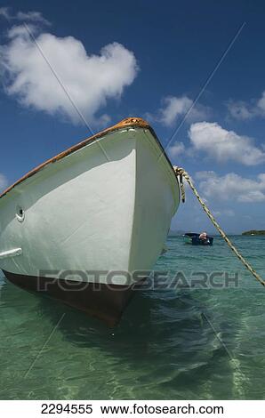 Stock Photography - Caribbean, Grenada, Grenadines, Boat at Paradise Beach; Carriacou Island. Fotosearch