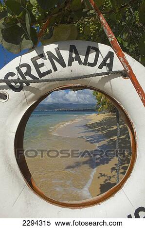 Stock Photography - Caribbean, Grenada, Life buoy with Grenada written on it; Magazine Beach. Fotosearch