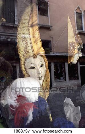 Stock Photo - Carnival Mask In Store Window, Close Up. Fotosearch