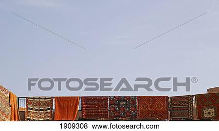 Stock Photo - Carpets In Stall In Souk, Marrakesh, Morocco. Fotosearch