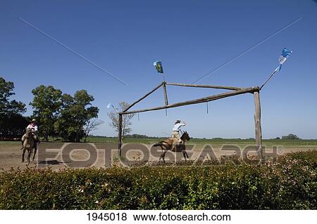 Stock Photo - Carrera de sortija (Race of the Ring), traditional game, Estancia Santa Susana, Los Cardales, Provincia de Buenos Aires, Argentina. Fotosearch