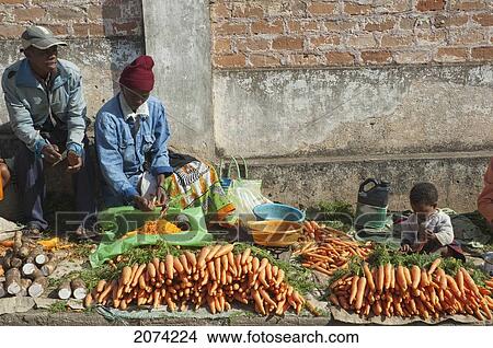Carrot Vendor At The Weekly Market In Fianarantsoa, Madagascar View Large Photo Image Picture - Carrot Vendor At The Weekly Market In Fianarantsoa, Madagascar. Fotosearch