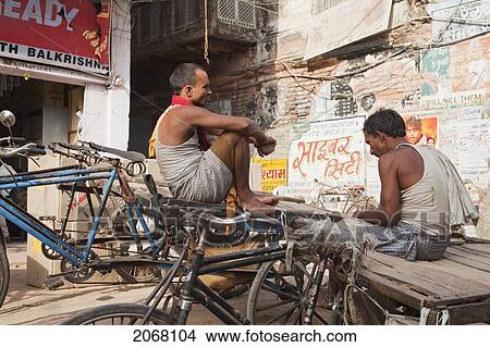 Cart Pullers Taking A Rest In Patna, Bihar, India View Large Photo Image Picture - Cart Pullers Taking A Rest In Patna, Bihar, India. Fotosearch