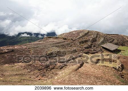 Stock Photograph - Carved Stone Hill Of El Fuerte De Samaipata, Santa Cruz Department, Bolivia. Fotosearch