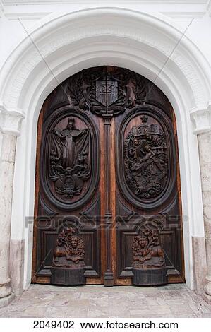 Stock Image - Carved Wooden Door Of La Merced Church, Cuenca, Azuay, Ecuador. Fotosearch