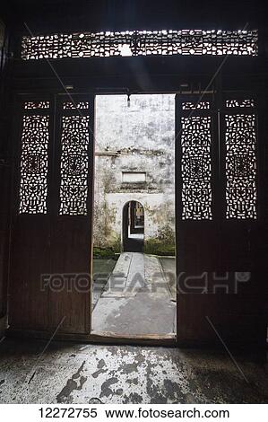 Carved wooden doors of Chengzhi Hall, Hongcun, Anhui, China View Large Photo Image Stock Photography - Carved wooden doors of Chengzhi Hall, Hongcun, Anhui, China. Fotosearch