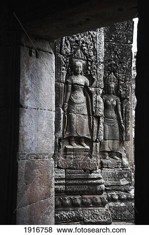 Carving Of Apsara Dancers View Large Photo Image Stock Photo - Carving Of Apsara Dancers. Fotosearch