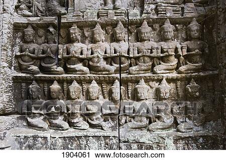 Carvings On Wall Of Ta Prohm, Angkor, Siem Reap, Cambodia View Large Photo Image Stock Image - Carvings On Wall Of Ta Prohm, Angkor, Siem Reap, Cambodia. Fotosearch