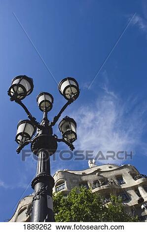 Stock Image - Casa Mila And Lamp Post. Fotosearch