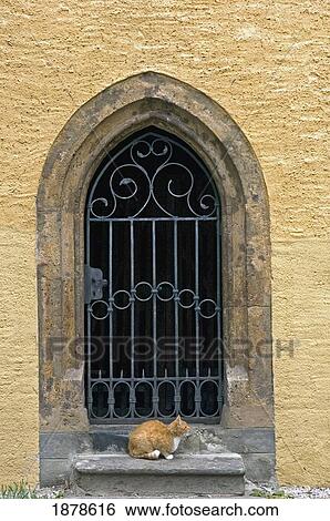 Cat Sitting On Window Sill At Millstatt Monastery View Large Photo Image Stock Photograph - Cat Sitting On Window Sill At Millstatt Monastery. Fotosearch