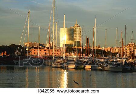 Catalonia, Barcelona, Spain; The Harbour Of Barcelona Late At Sunset View Large Photo Image Stock Photography - Catalonia, Barcelona, Spain; The Harbour Of Barcelona Late At Sunset. Fotosearch